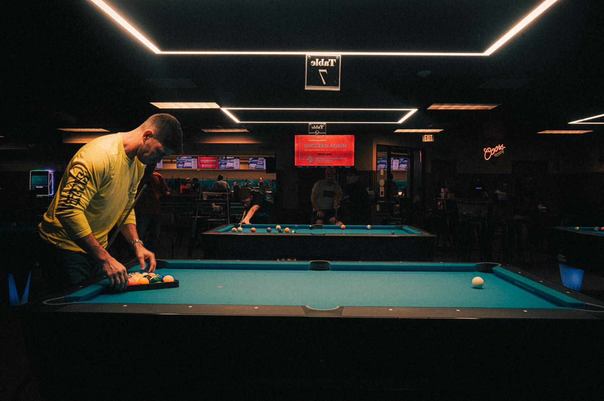 Pool player preparing for the next rack